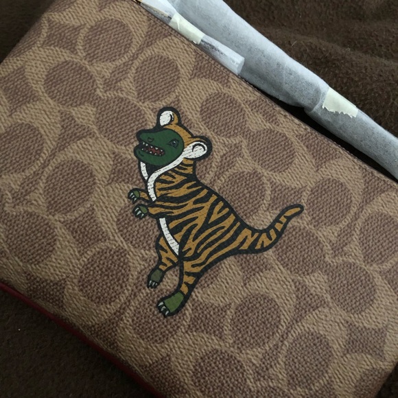 Coach Handbags - NWT Coach Tiger/Rexy RARE wristlet!! Price FIRM